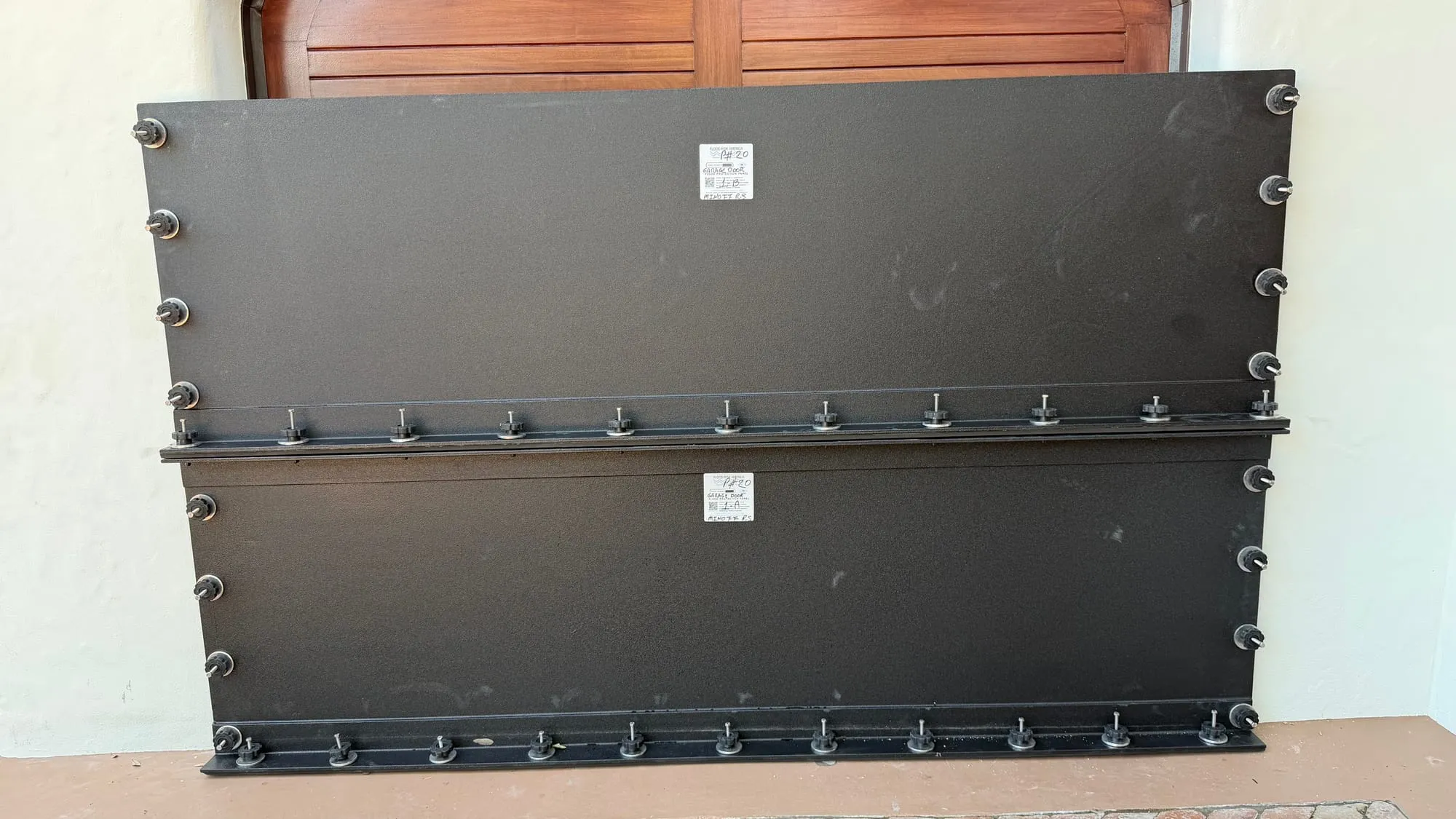 Minoff House flood panel installation 7