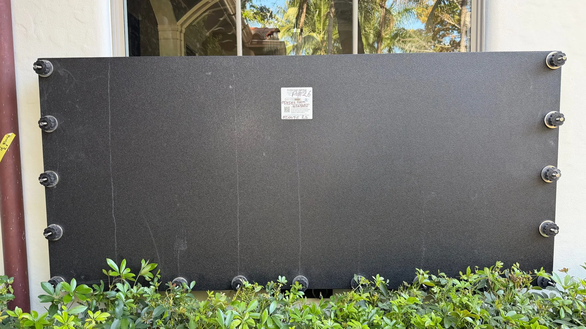 Minoff House flood panel installation 8