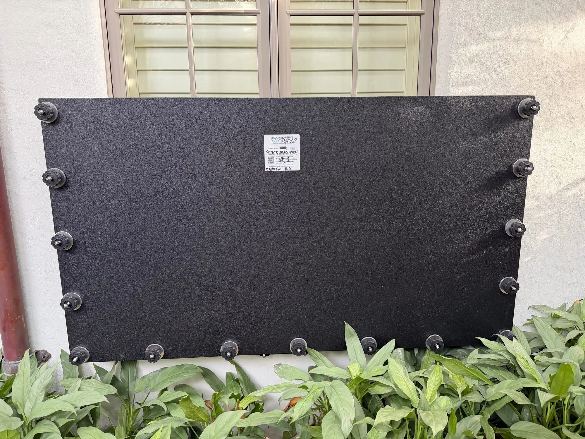 Minoff House flood panel installation 9