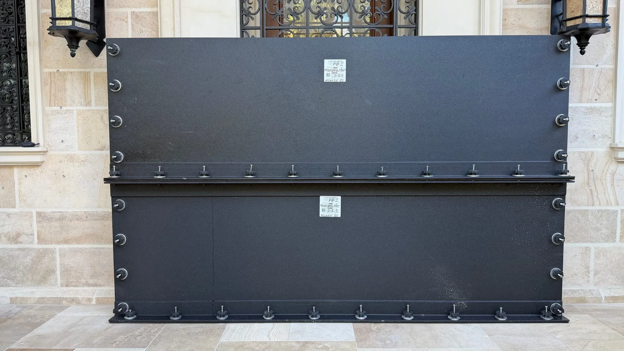 Minoff House flood panel installation 1