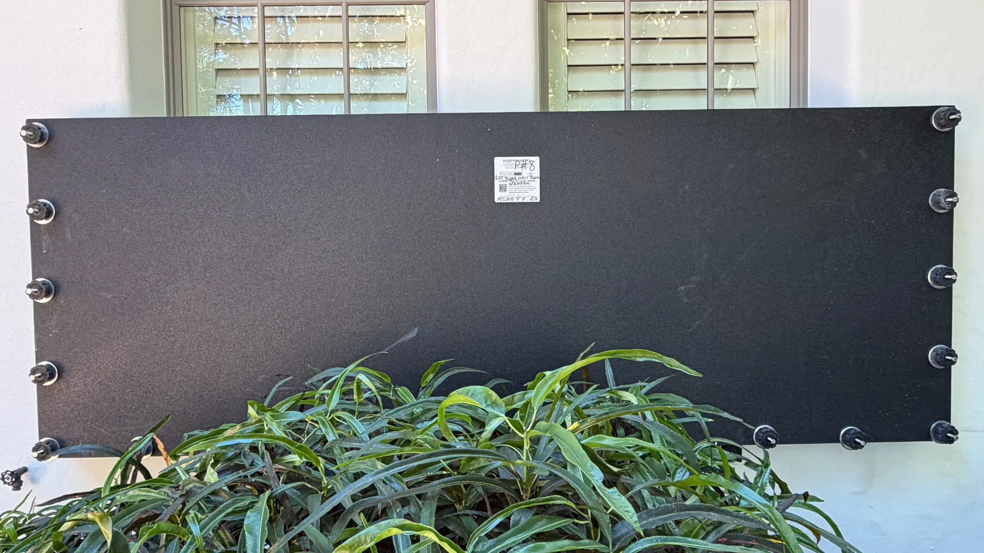 Minoff House flood panel installation 2