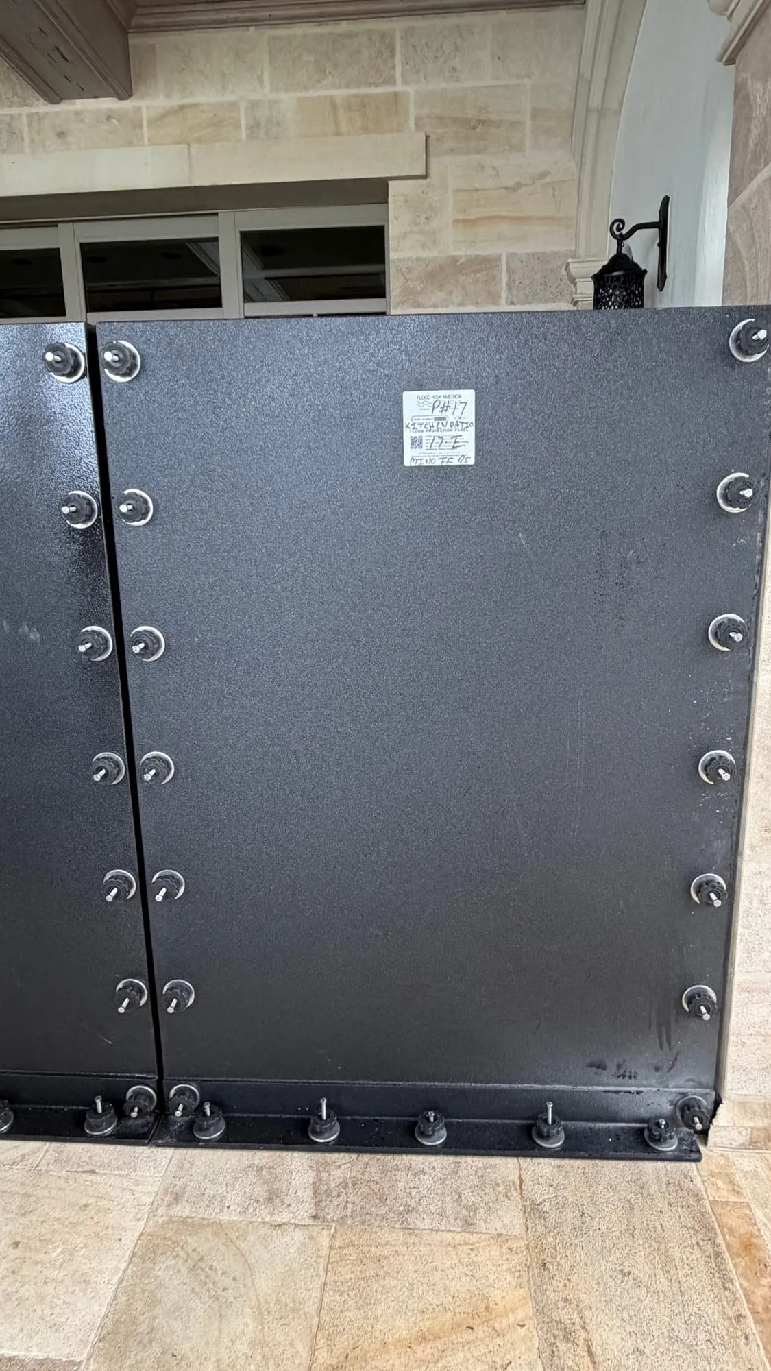 Minoff House flood panel installation 6