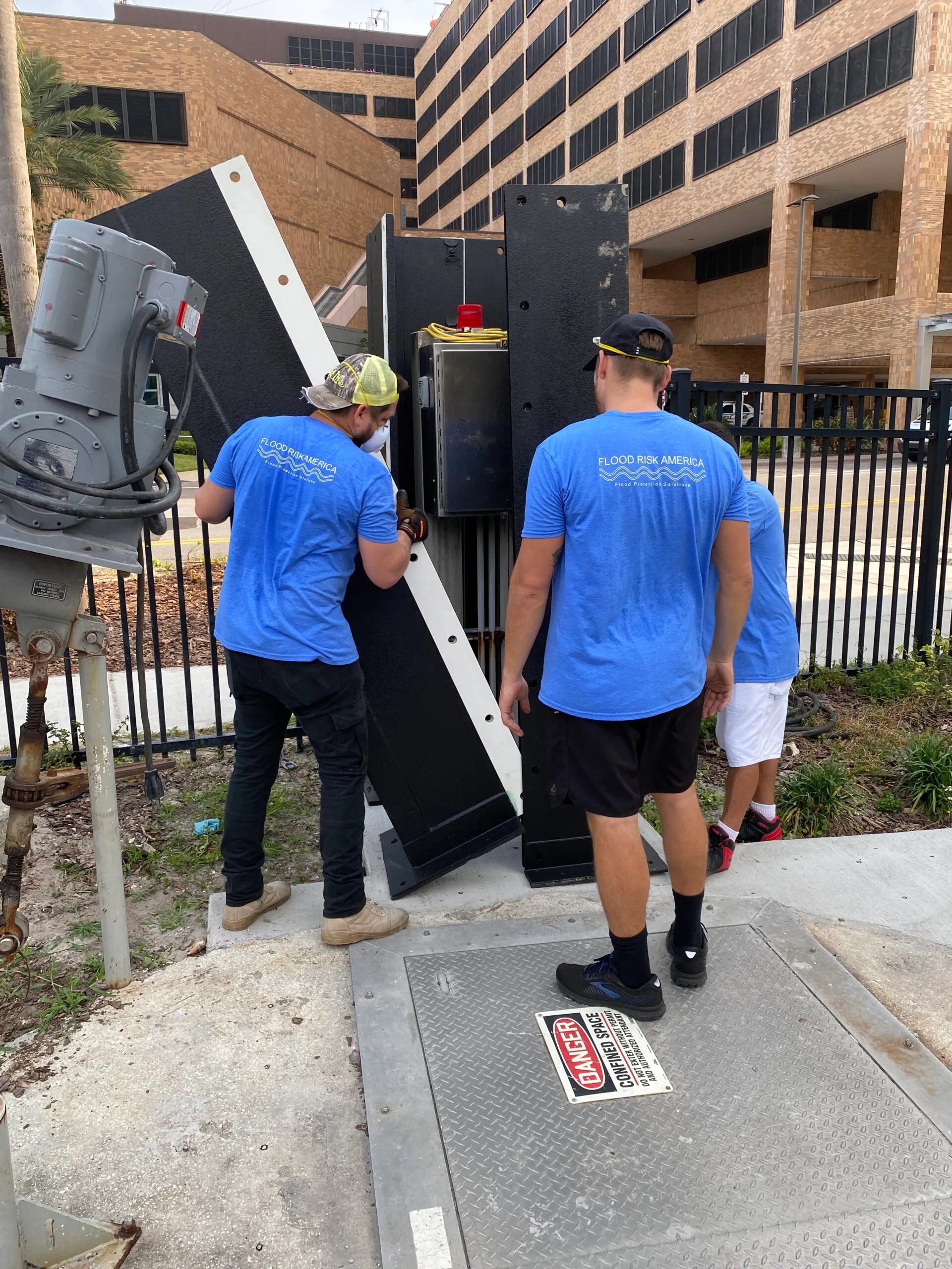 FRA team installing flood panels